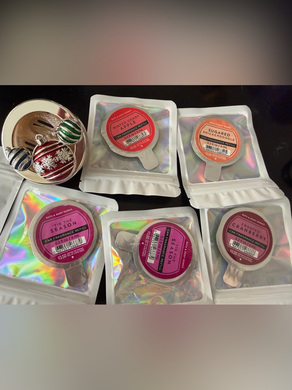 Bath & Body works holiday fragrance holder for your car plus 5 refills